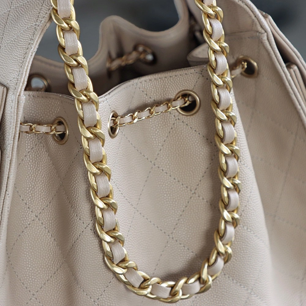 The Chanel 25 Hand Gag