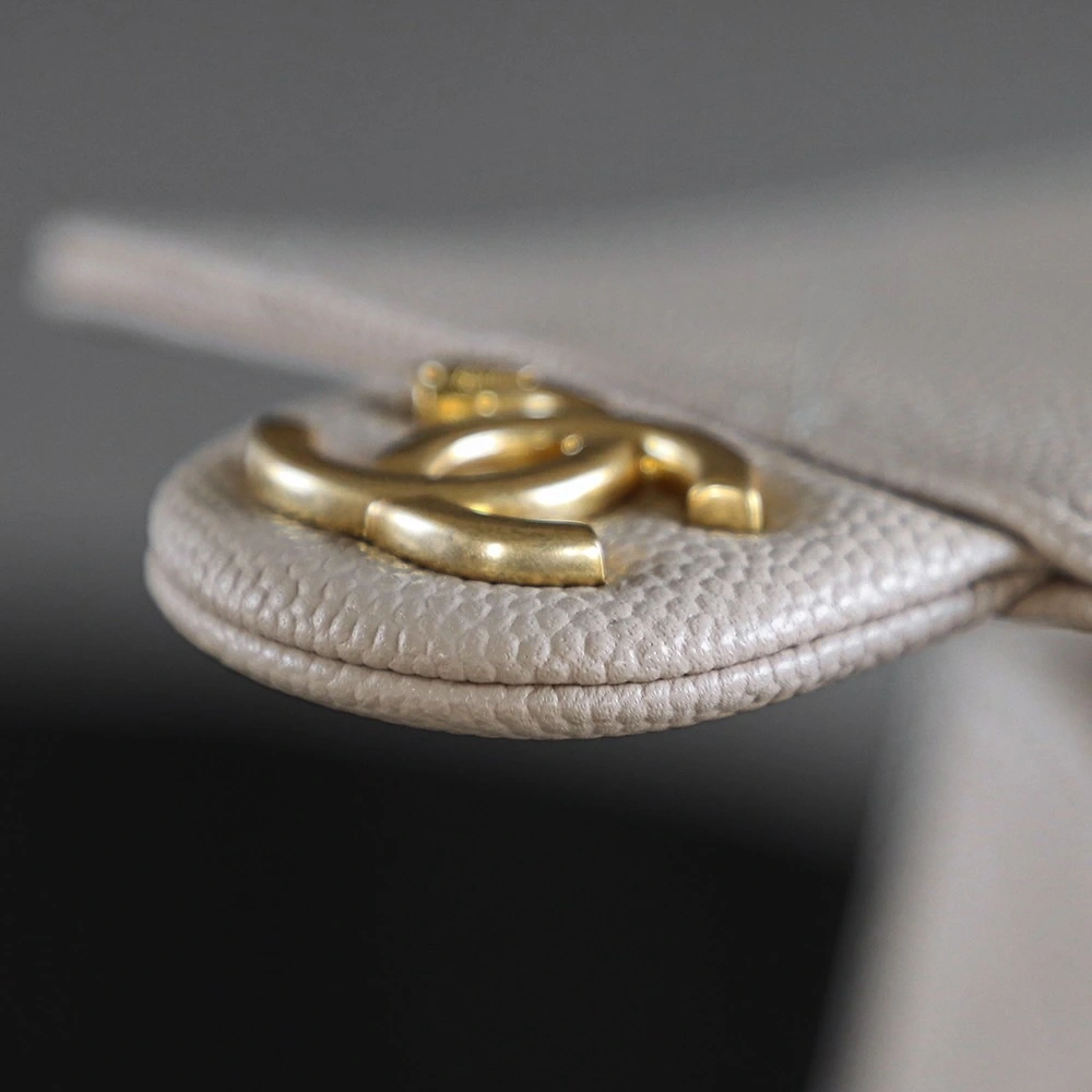 The Chanel 25 Hand Gag