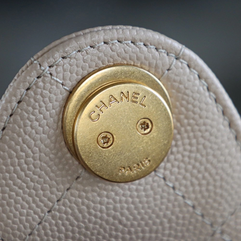 The Chanel 25 Hand Gag