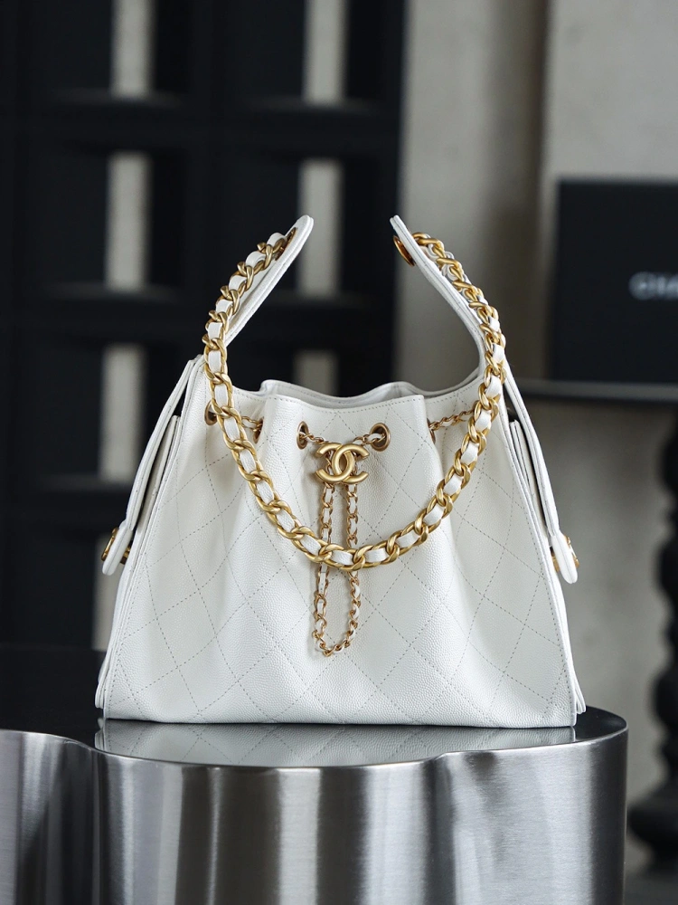 The Chanel 25 Hand Gag
