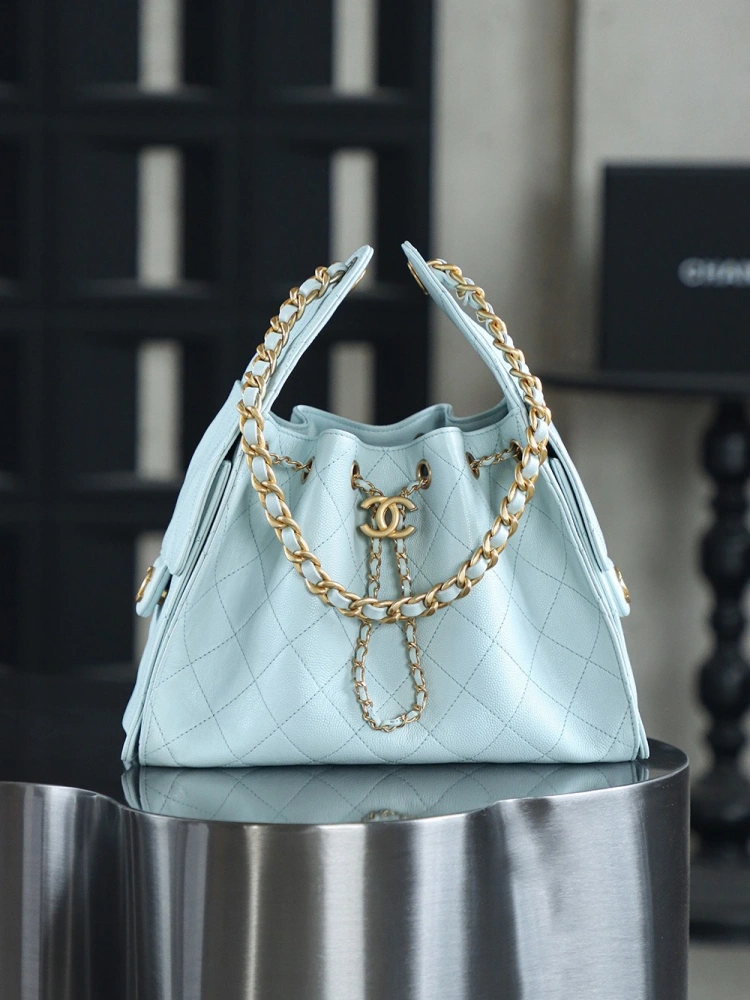 The Chanel 25 Hand Gag
