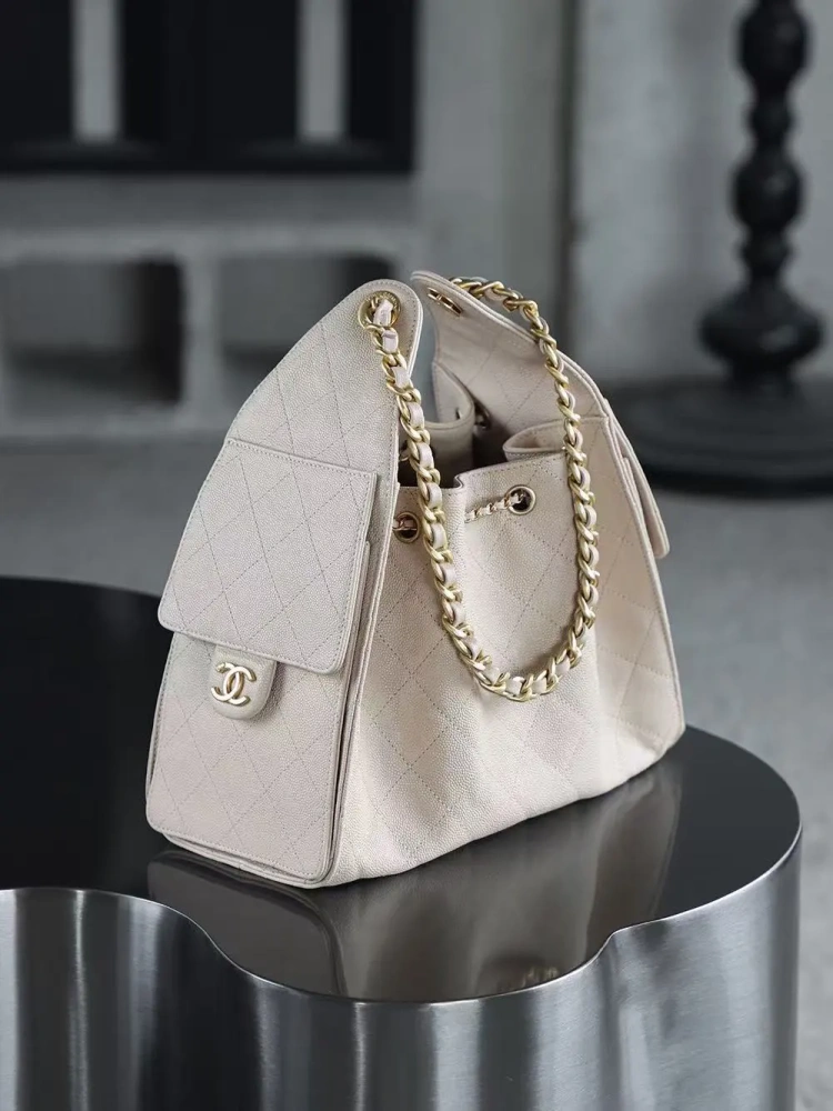 The Chanel 25 Hand Gag