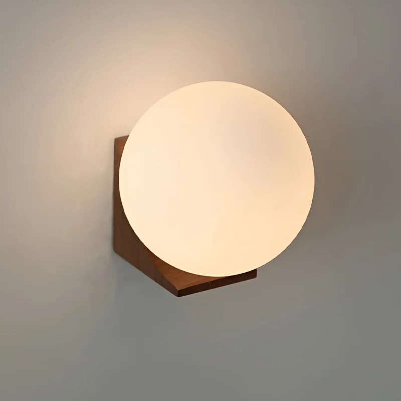 walnut wood detail on modern wall sconce
