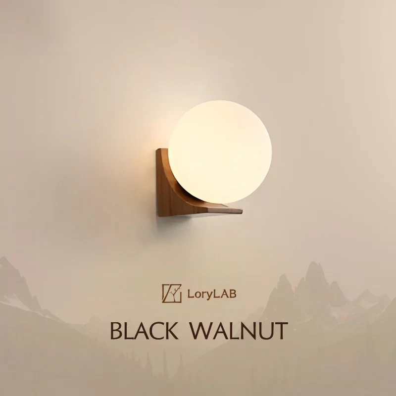 modern wooden wall sconce with round glass