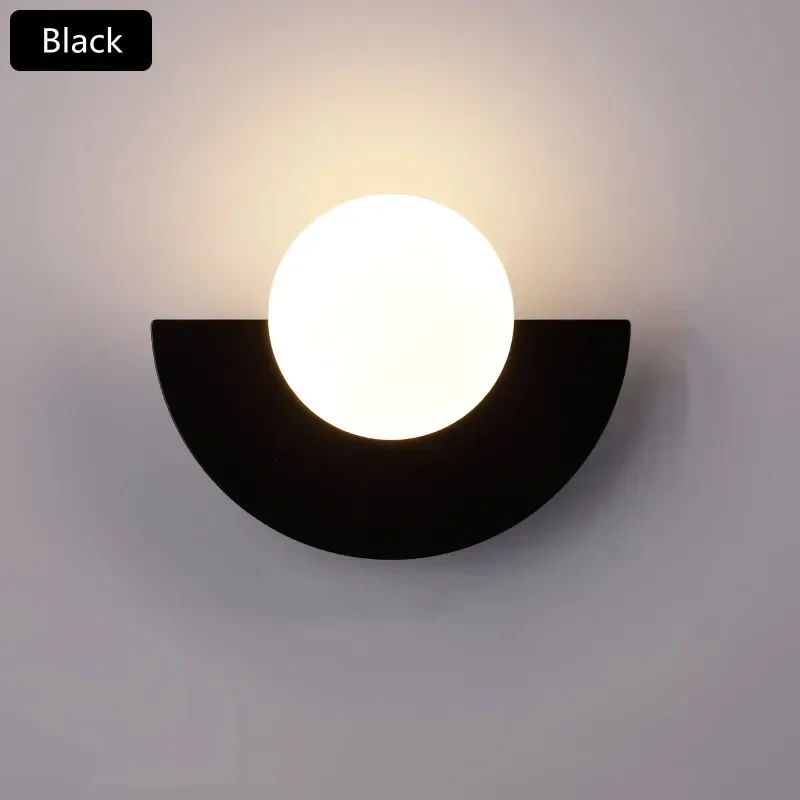 Black glass ball wall sconce for interior lighting