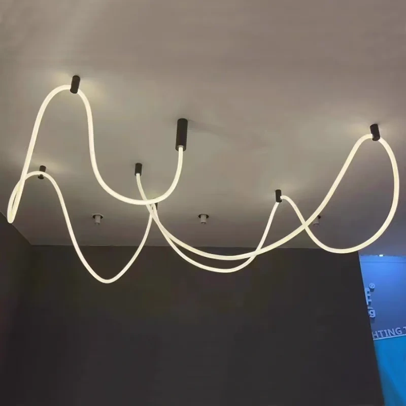 Flexible silicone LED chandelier installed above a living room