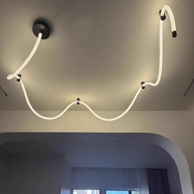 LED rope chandelier arranged in overlapping curves across a ceiling