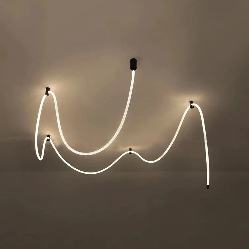Flexible LED chandelier with curved rope lighting and black ceiling mounts