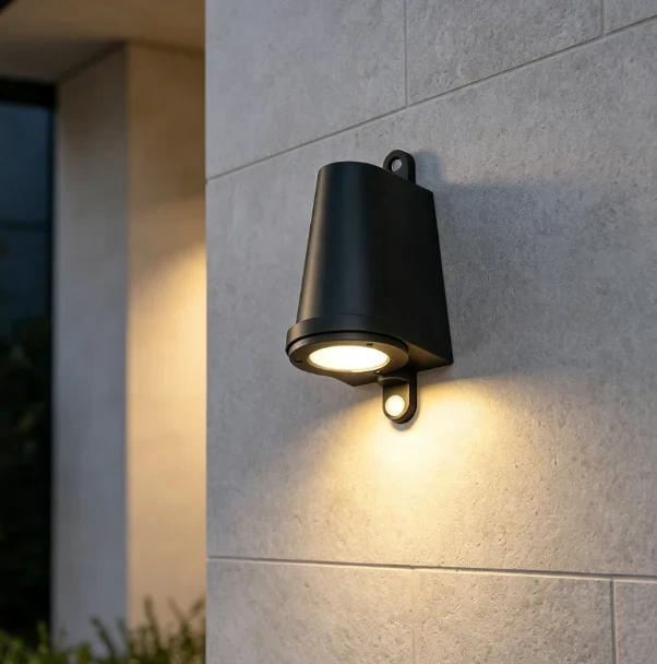 Matte black outdoor wall light shown with dimension labels