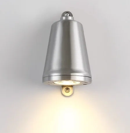 Silver-toned industrial wall light with a tapered housing and downward illumination