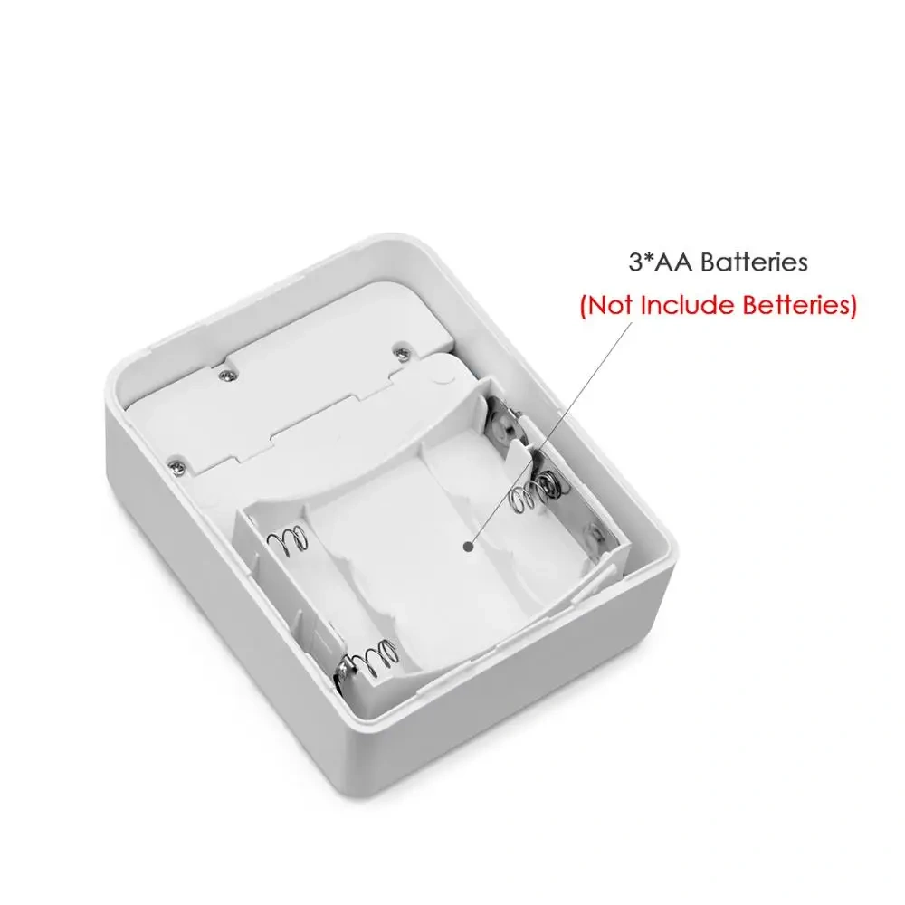 Open battery compartment for three AA batteries in an LED night light