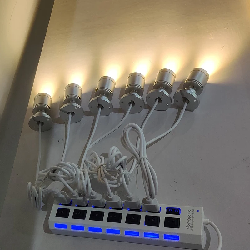 USB hub with individual port switches for mini LED spotlight connections