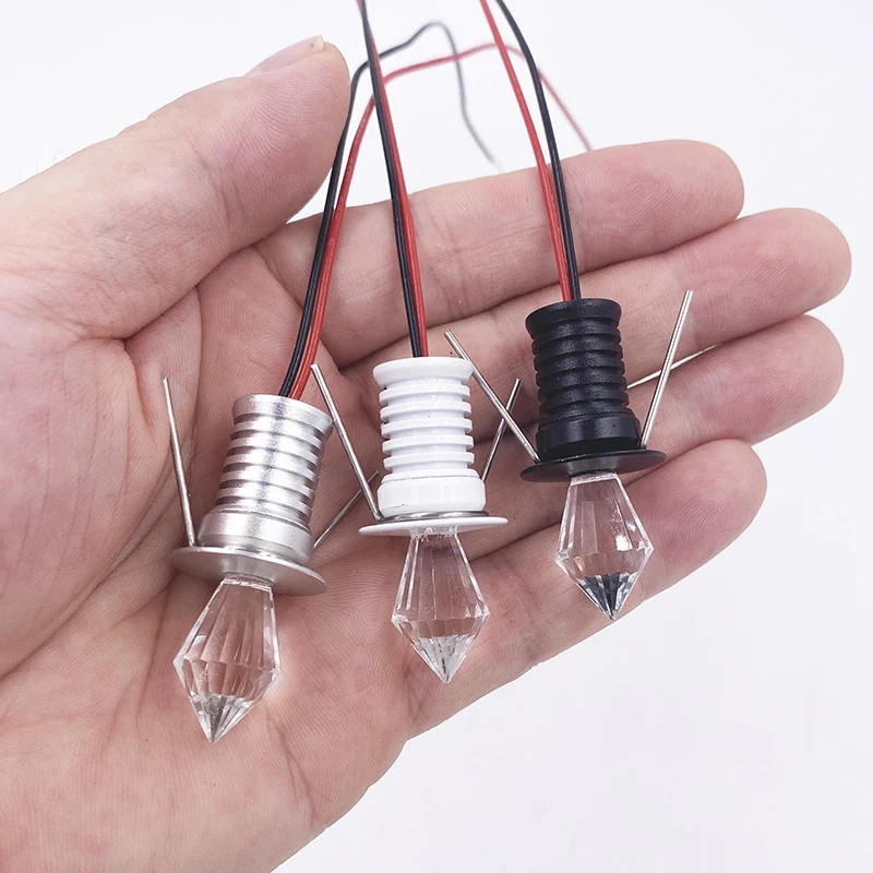 Silver mini recessed LED spotlight with a clear crystal-style tip