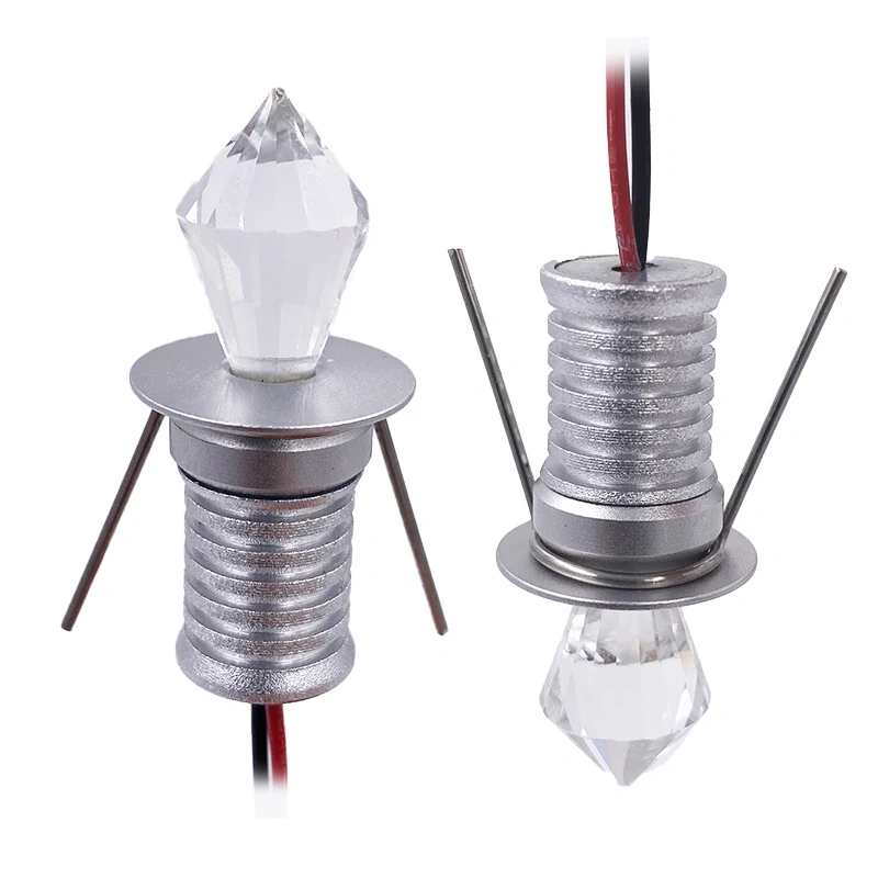 Two mini recessed LED spotlights with red and black power leads