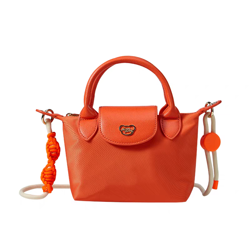 NOISY TEDDY25's new youthful, beautiful, light luxury and high-end women's hand-held crossbody bag is fashionable and trendy