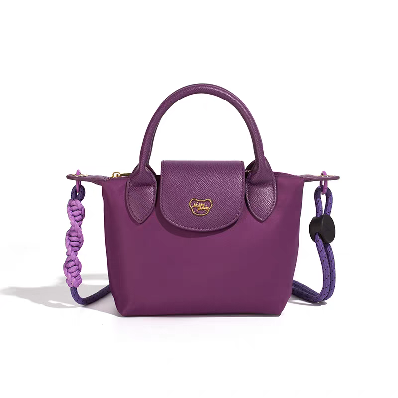 NOISY TEDDY25's new youthful, beautiful, light luxury and high-end women's hand-held crossbody bag is fashionable and trendy