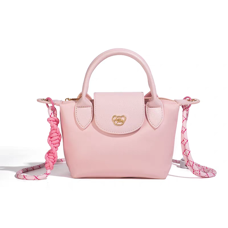NOISY TEDDY25's new youthful, beautiful, light luxury and high-end women's hand-held crossbody bag is fashionable and trendy
