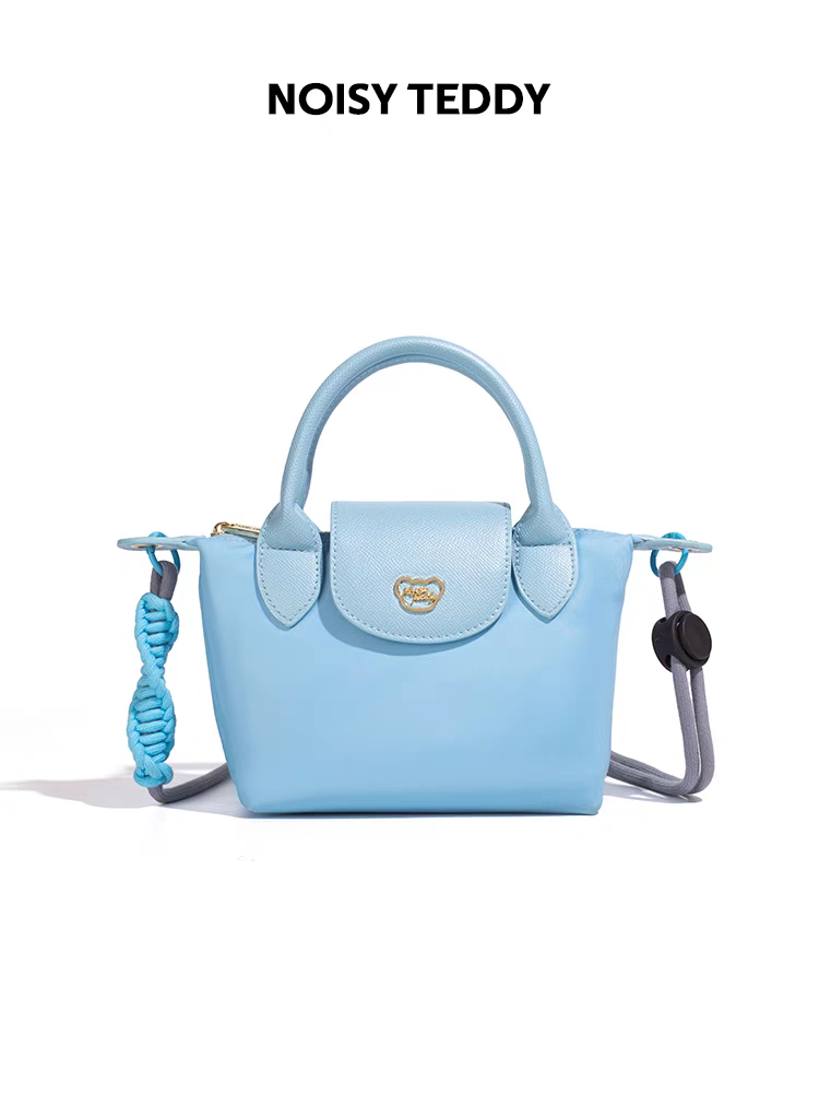 NOISY TEDDY25's new youthful, beautiful, light luxury and high-end women's hand-held crossbody bag is fashionable and trendy