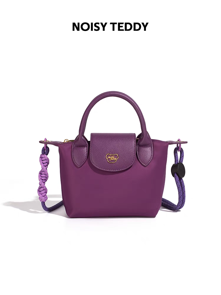 NOISY TEDDY25's new youthful, beautiful, light luxury and high-end women's hand-held crossbody bag is fashionable and trendy