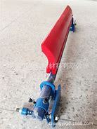 Conveyor belt cleaner