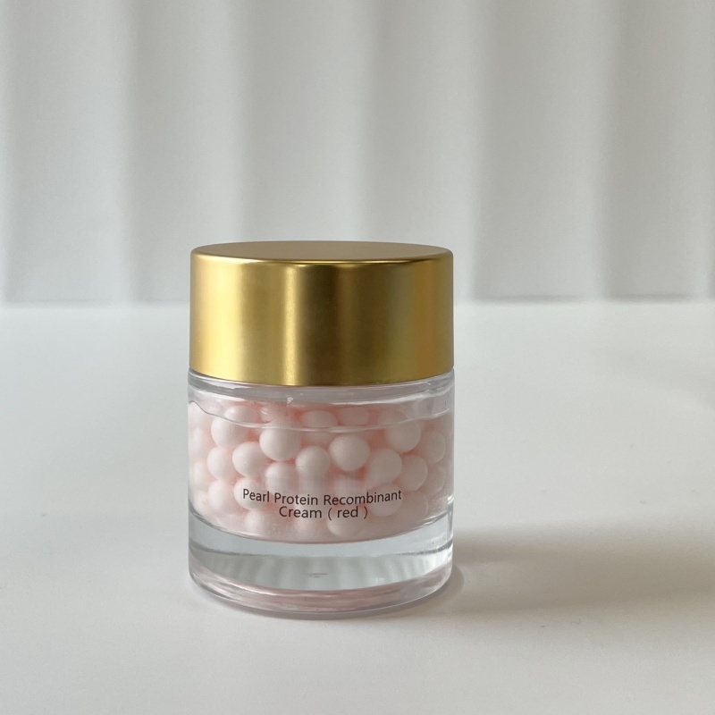 Wholesale red Pearl Protein Recombinant Cream single unit—transparent glass jar with golden lid, holding pink beaded cream, perfect for B2B beauty supplier & custom skincare packaging