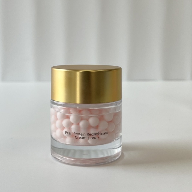 Wholesale red Pearl Protein Recombinant Cream single unit—transparent glass jar with golden lid, holding pink beaded cream, perfect for B2B beauty supplier & custom skincare packaging
