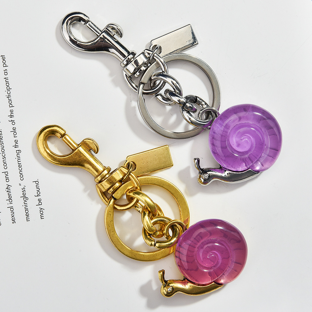 Creative crystal snail keychain, personalized metal pendant, cute bag pendant, small gift