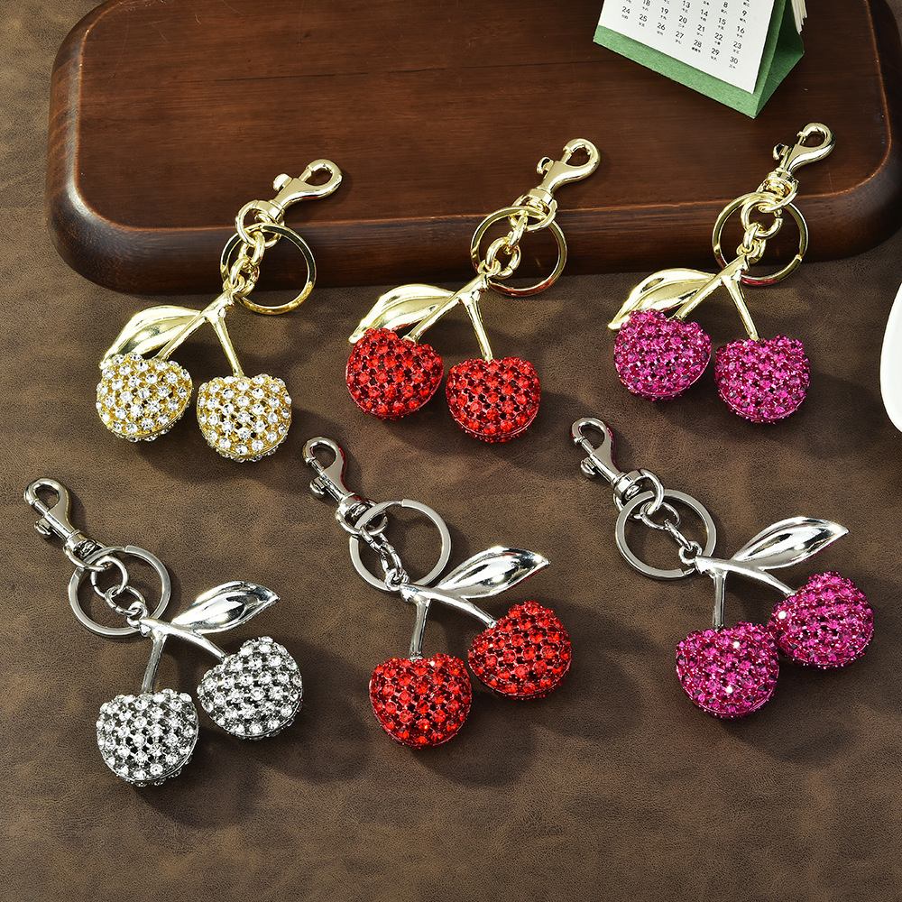 Diamond-encrusted cherry keychain | Put the "Shining Little Sweet" on the bag