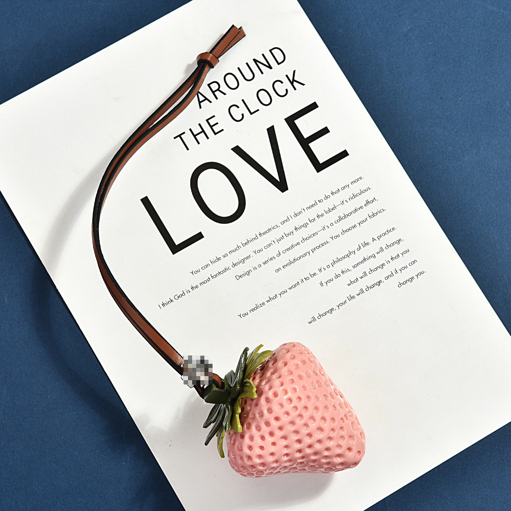 Strawberry Ornaments | Bags and necklaces are dual-purpose, lighting up the sweet and cool style