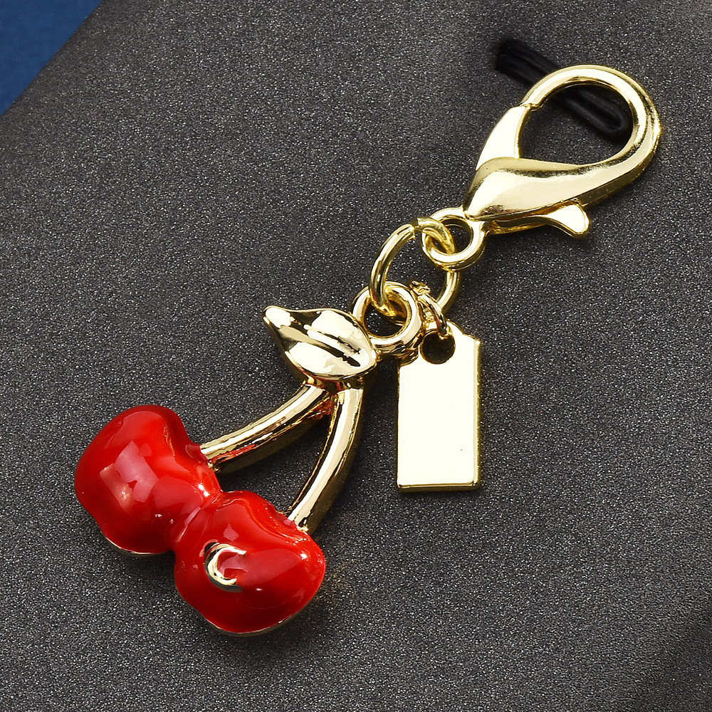 Cherry-themed keychains | Hang the "sweet little beauty" on the bag