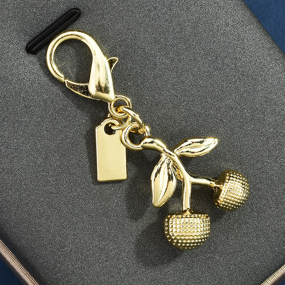 Cherry-themed keychains | Hang the "sweet little beauty" on the bag