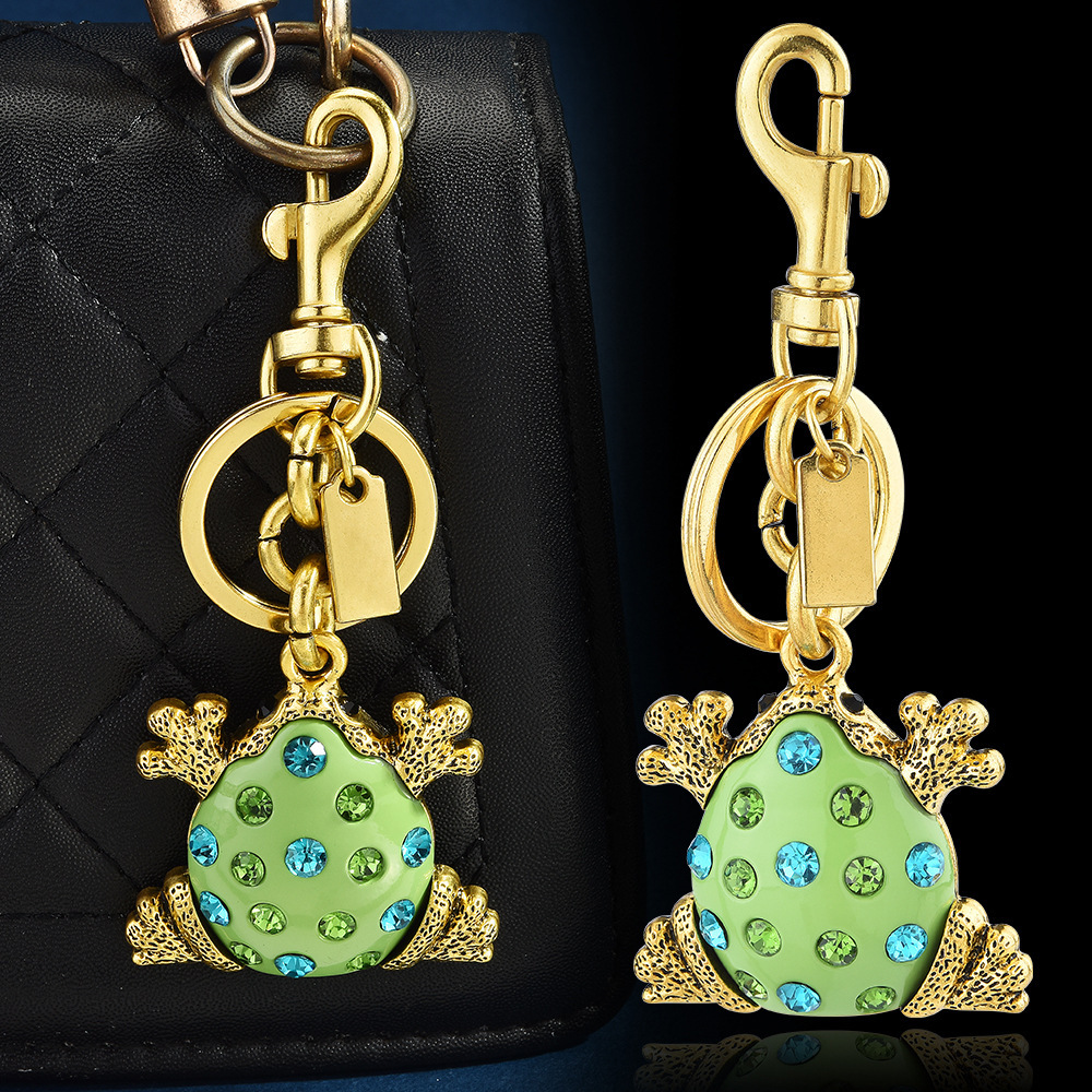Diamond-encrusted frog keychain | Put the "Fun Little Lucky" hanging bag on it