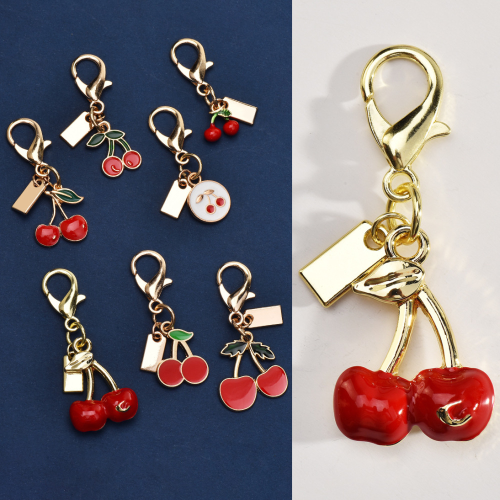 Cherry-themed keychains | Hang the "sweet little beauty" on the bag