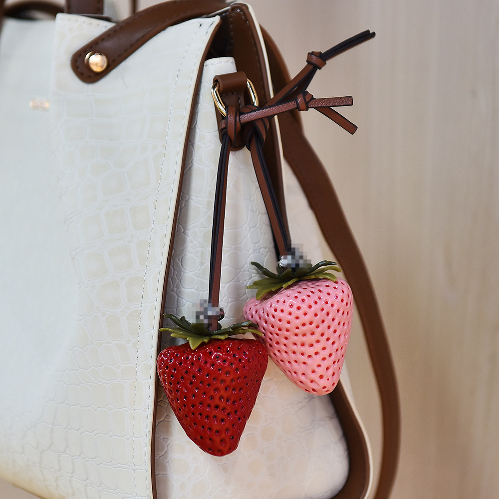 Strawberry Ornaments | Bags and necklaces are dual-purpose, lighting up the sweet and cool style