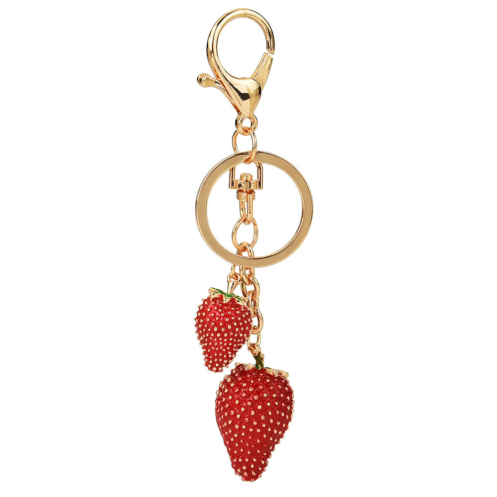 Diamond-encrusted strawberry keychain | Wrap the "Sweet Cool Strawberry" in a hanging bag