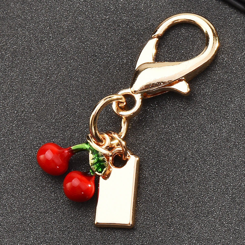 Cherry-themed keychains | Hang the "sweet little beauty" on the bag