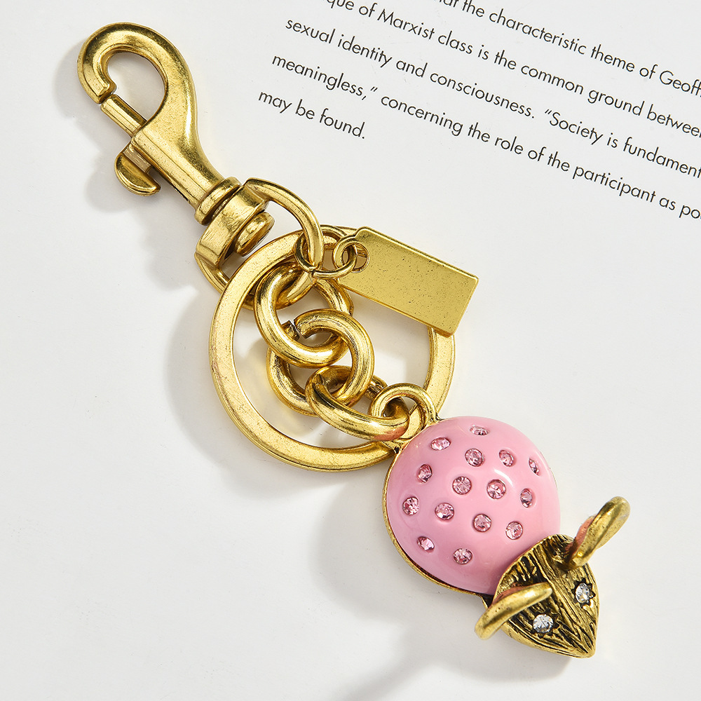 Diamond-encrusted strawberry keychain | Size "Sweet Bomb" charm