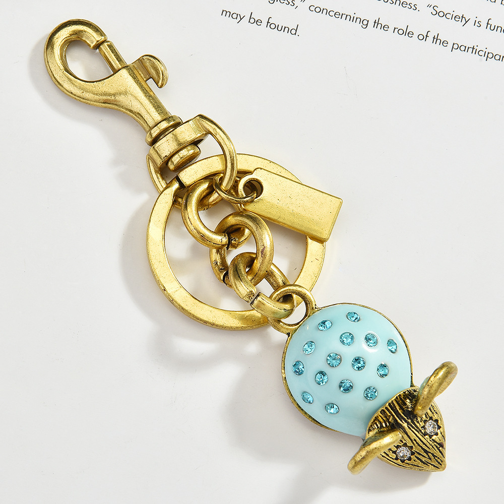 Diamond-encrusted strawberry keychain | Size "Sweet Bomb" charm