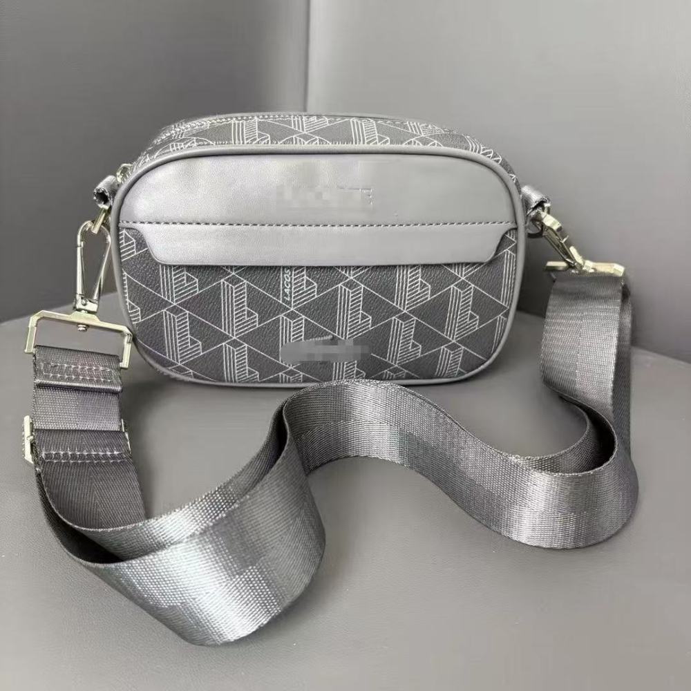 LACOSTE Textured geometric print crossbody bag for a high-end fashion look.