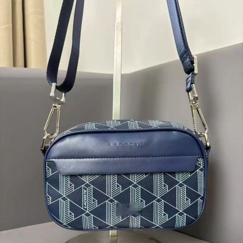LACOSTE Textured geometric print crossbody bag for a high-end fashion look.