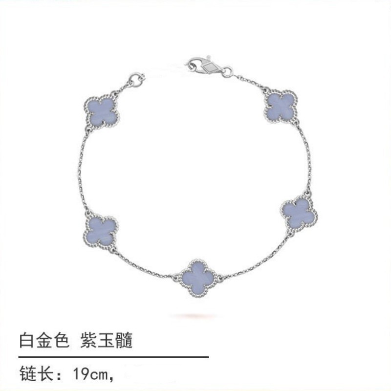 White gold and black onyx diamond four-leaf clover bracelet