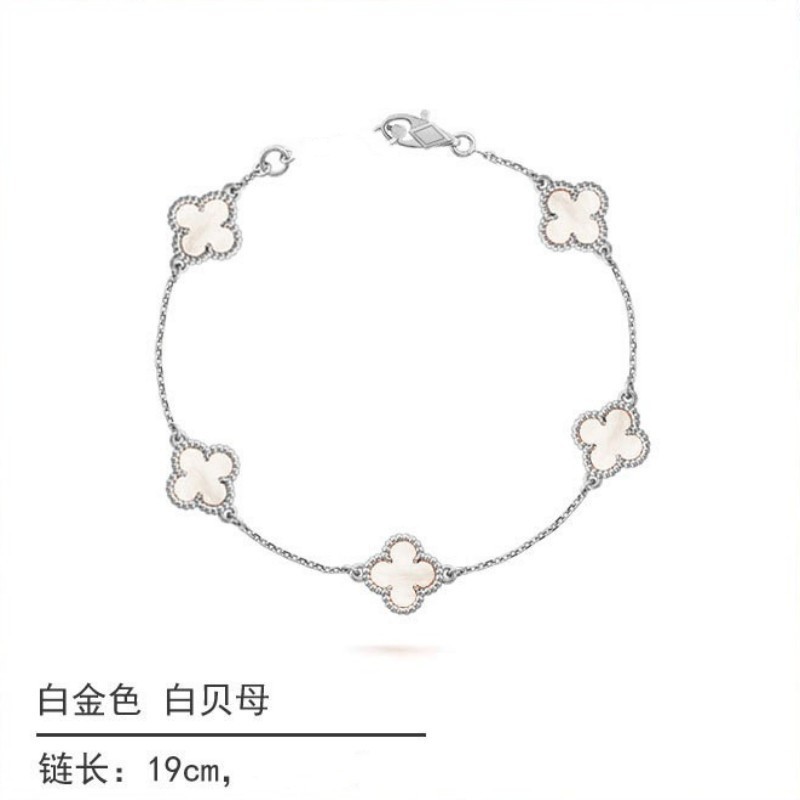 White gold and black onyx diamond four-leaf clover bracelet