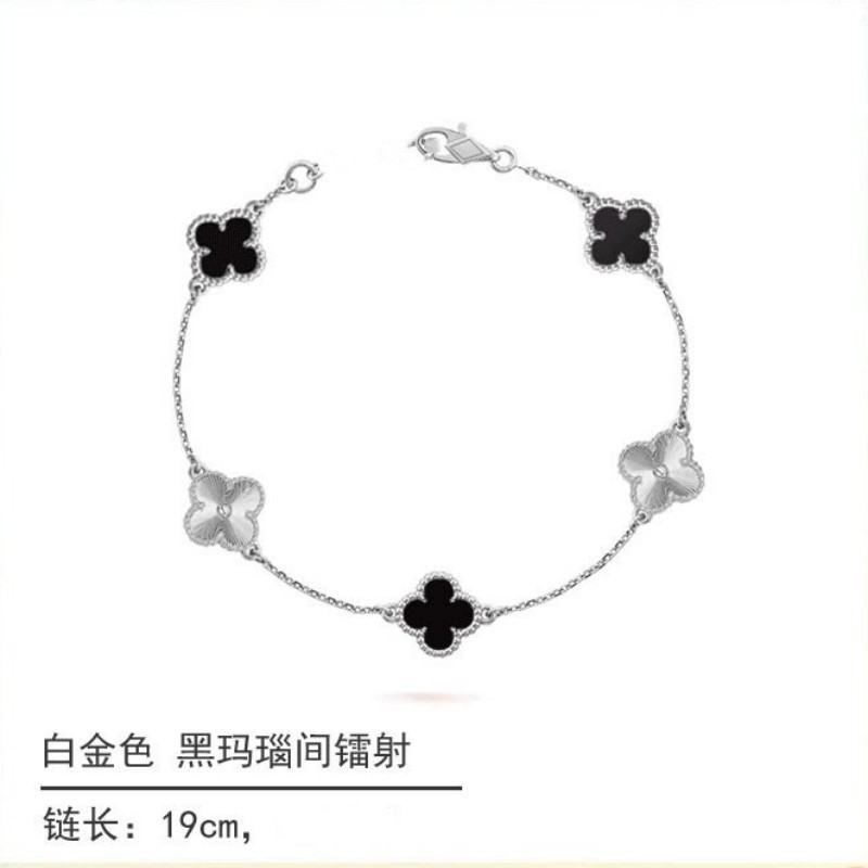 White gold and black onyx diamond four-leaf clover bracelet