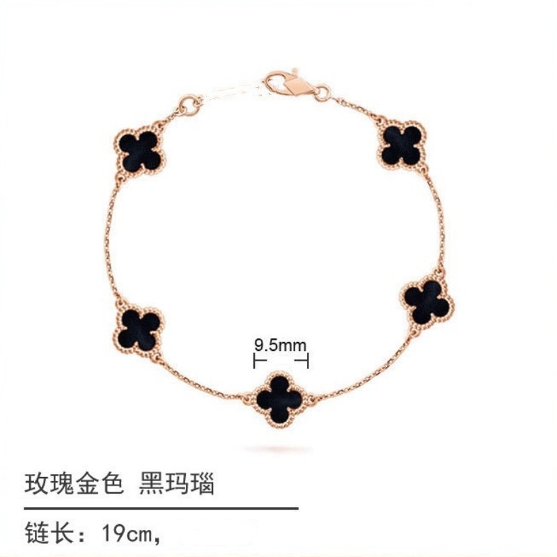 White gold and black onyx diamond four-leaf clover bracelet