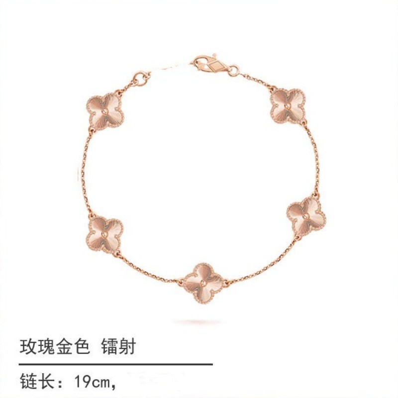 White gold and black onyx diamond four-leaf clover bracelet