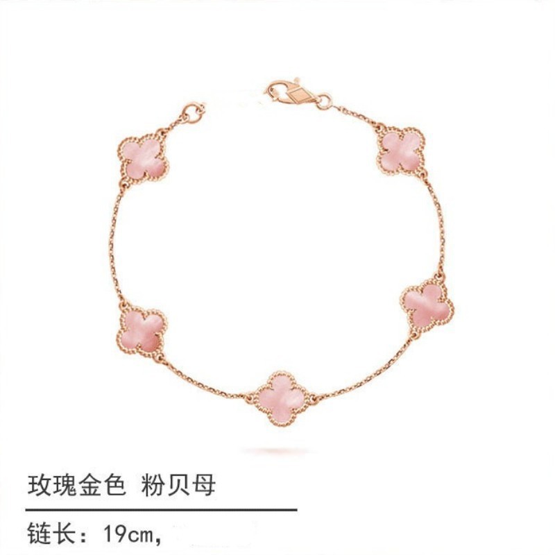 White gold and black onyx diamond four-leaf clover bracelet