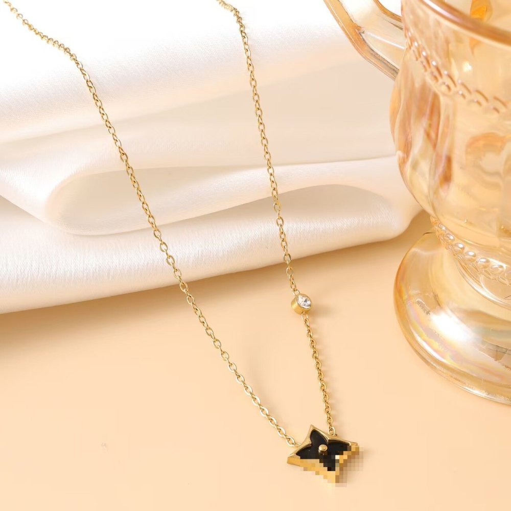 Diamond-encrusted four-leaf clover necklace