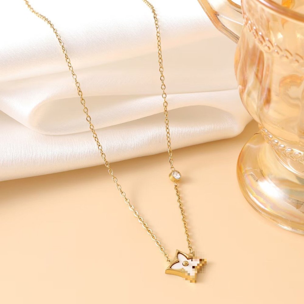 Diamond-encrusted four-leaf clover necklace