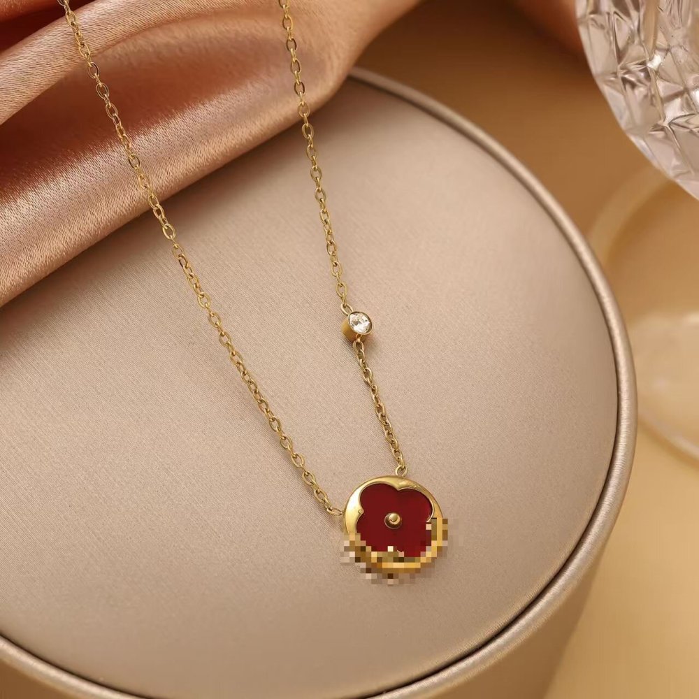 Diamond-encrusted four-leaf clover necklace