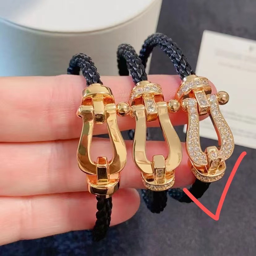 Diamond-encrusted braided leather cord bracelet